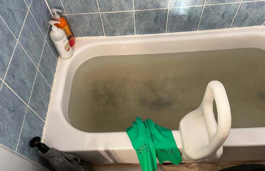 bathtub drain clogged due to hair v