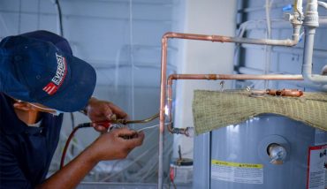 repairing hot water heat by everest prof. plumber